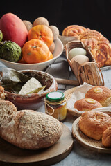 Obraz na płótnie Canvas Homemade bread sourdough, rustic baked bread in wickerwork basket