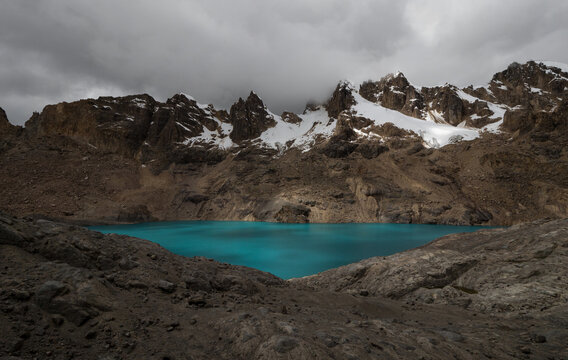 Panorama view of turquoise Cordillera Huayhuash Circuit alpine andes mountain lake Trapecio Ancash Peru South America