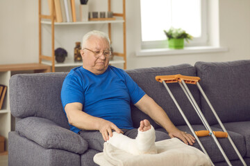 Rehabilitation after domestic or car accident injury: Senior male stays at home, waiting for bone...