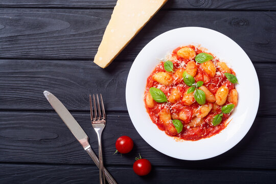 Italian homemade potatoes gnocchi with tomatoes sauce