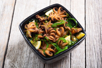 Baby octopus fried with lemon