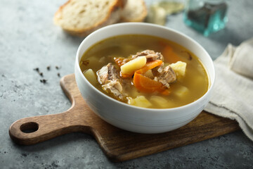 Traditional homemade salmon soup with vegetables
