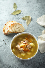 Traditional homemade salmon soup with vegetables