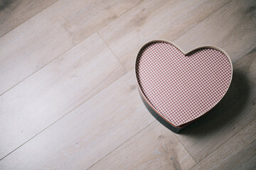 Striped Heart Box On A Wooden Surface