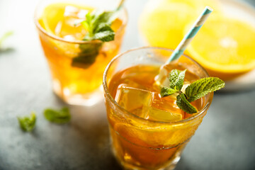 Fototapeta na wymiar Healthy orange drink with fresh mint