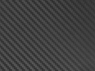 black kevlar pattern an abstract texture background by closeup surface of metallic or plastic composit costing