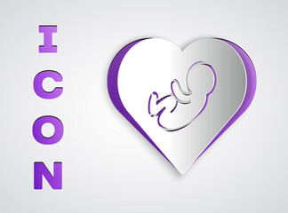 Paper cut Baby inside heart icon isolated on grey background. Paper art style. Vector.