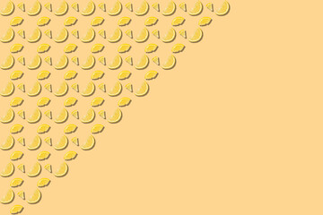 different lemon pieces - diagonal pattern with copy space - beige