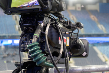 TV at the soccer. video camera back football goal.