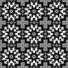 Ethnic geometric seamless pattern with star motif. Northeast Caucasian pattern. Black and white colors. Sample is included in swatches panel.