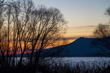 Naklejka premium Nove Mlyny reservoir and Palava hills during sunrise in winter, Southern Moravia, Czech Republic