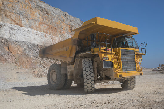 Mining tractor working in open pit