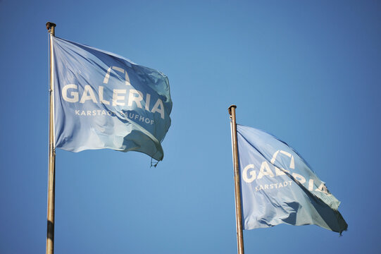 Hamburg, Germany - August 5, 2020: Flags with the logo of Galeria Kartstadt Kaufhof in Hamburg, Germany - Galeria Karstadt Kaufhof is a German department store chain