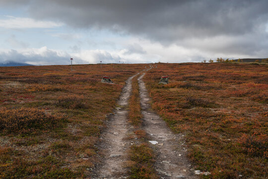 Parallel trails lead thogh high mountain landscape along Kungsleden Trail, Lapland, Sweden