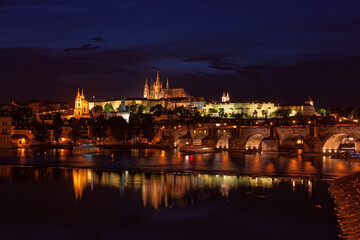 Obraz na płótnie Canvas Evening view of Prague Castle and Charles Bridge over Vltava river from Novotneho Lavka, Prague, Czech