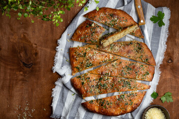 Traditional Italian Focaccia with basil and garlic