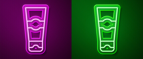 Glowing neon line Tube of toothpaste icon isolated on purple and green background. Vector.