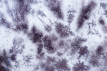 tie dye pattern hand dyed on cotton fabric abstract texture background.