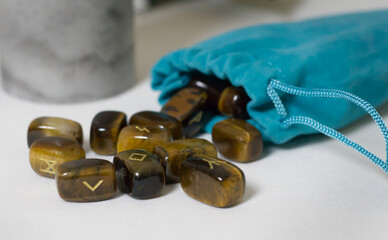 Nordic Viking  Rune Collection Spilling from a teal bag