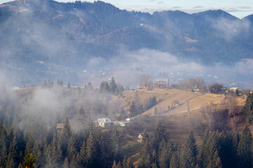 Fog in the morning in a village in the mountains