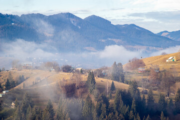 Fog in the morning in a village in the mountains