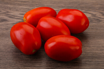 Red bright tasty tomato heap
