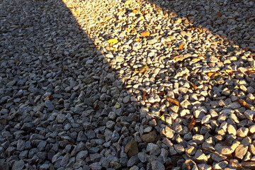 Natural stone pebble material texture background. stone background, dark gravel pebbles stone