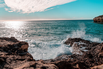 Sunrise on the sea rocks