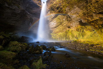 Fototapeta na wymiar Icelandic waterfall with rainbow