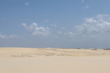 a dune and a blue sky 