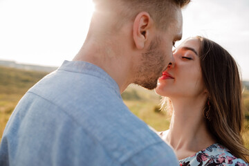 Fototapeta premium young loving couple hugging outside. concept of happiness and love. close up photo. love story