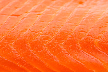 Salmon fillet background. A background of fresh smoked salmon