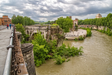 Panoramic view of the Pons Aemilius and Tiber island. View of the ancient Ponte Rotto or Pons...