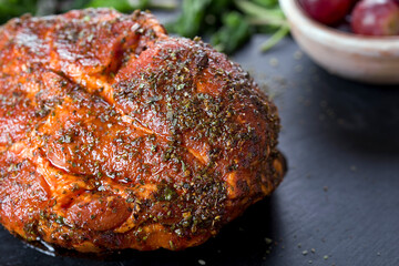 roast with herbs on a black stone © Patrycja