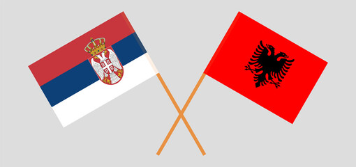 Crossed flags of Serbia and Albania