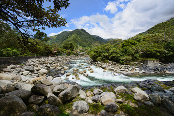 Fototapeta na wymiar The beautiful river at the beautiful Paílón Del Diablo waterfall, Baños de Agua Santa, Ecuador