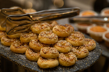 Buffet table with various cookies and biscuits, tarts and cakes