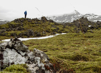 Iceland landscape, winter road trip, hiker in the moss.