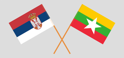 Crossed flags of Serbia and Myanmar