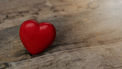 Happy Valentine's Day background banner greeting card - Red heart on rustic vintage wooden table texture wood