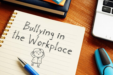 Bullying in the Workplace is shown on the conceptual business photo
