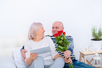 Senior Man Surprising Wife With A Rose. Relationship, Getting Old Together, Love Concept