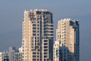 Fototapeta na wymiar Facade of a new modern high-rise residential buildings