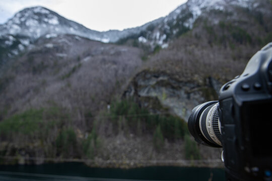 A camera snapping photographs of a beautiful landscape in Washington State