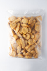 nugget package with translucid, transparente plastic bag, chicken tenders. white background