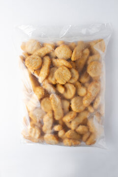 Nugget Package With Translucid, Transparente Plastic Bag, Chicken Tenders. White Background