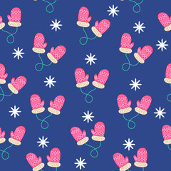 Seamless pattern with christmas mittens on blue background