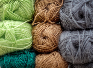 Set of colorful wool balls for knitting. Close-up photo background.