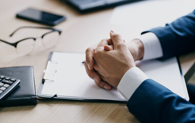 business finance documents on the table laptop glasses pen office stationery