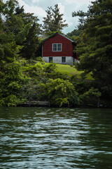 Obraz premium red house on the river